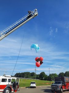 The Fire Department helping with the egg drop activity for STEM learning
