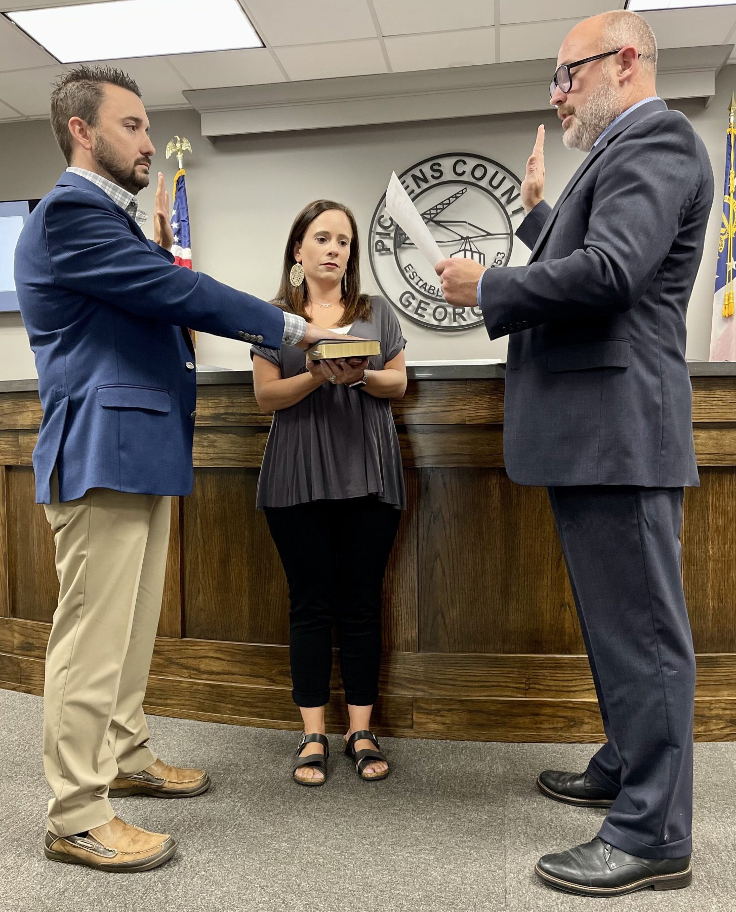 Josh Tippens is being sworn in as West End District One Commissioner